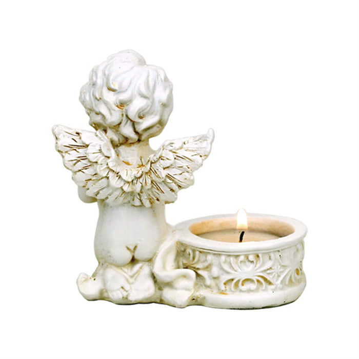 Two angels with candle holders image