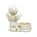 Two angels with candle holders image